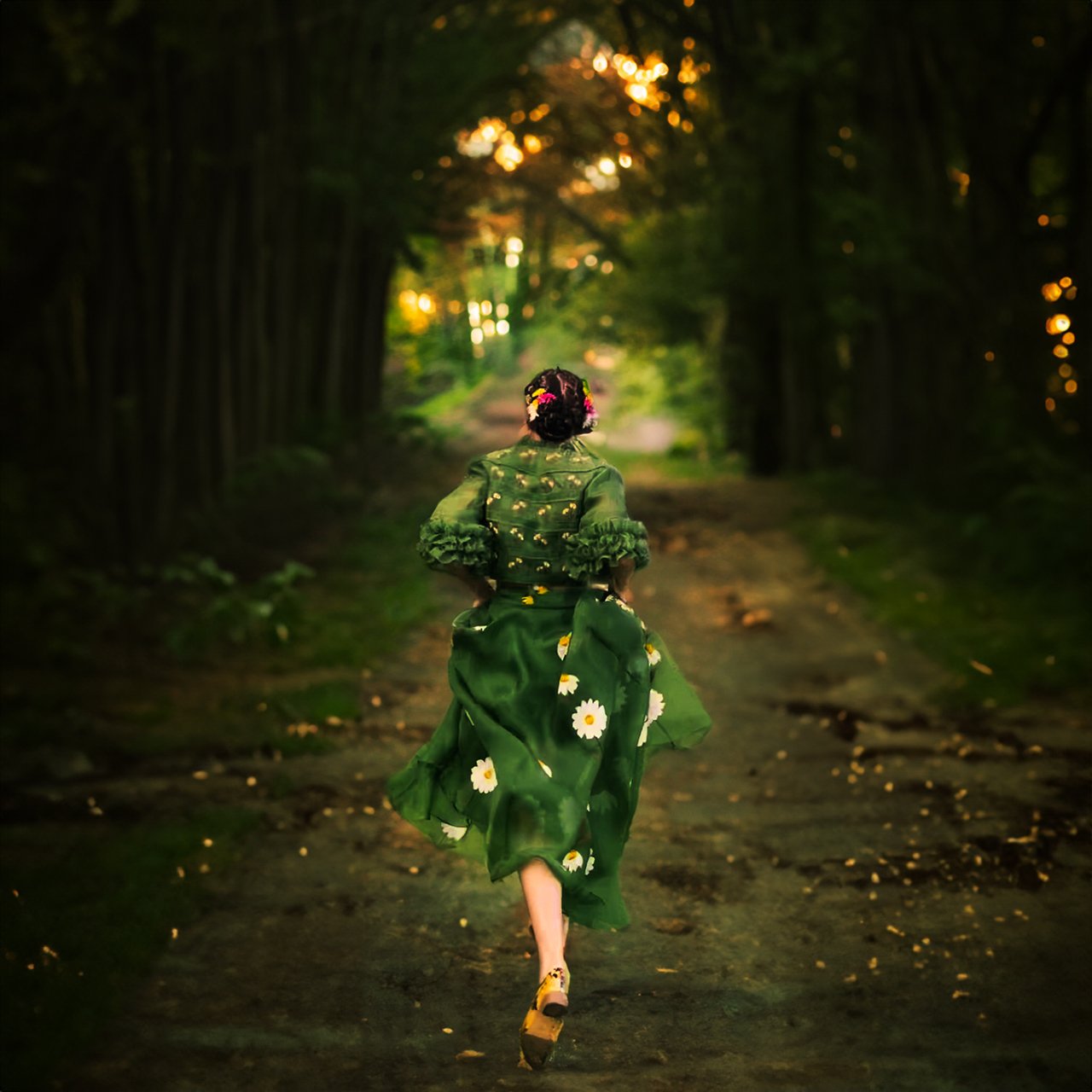 Woman in green traditional outfit walking through forest path, Baali brand photography by The Design Aura, baavli