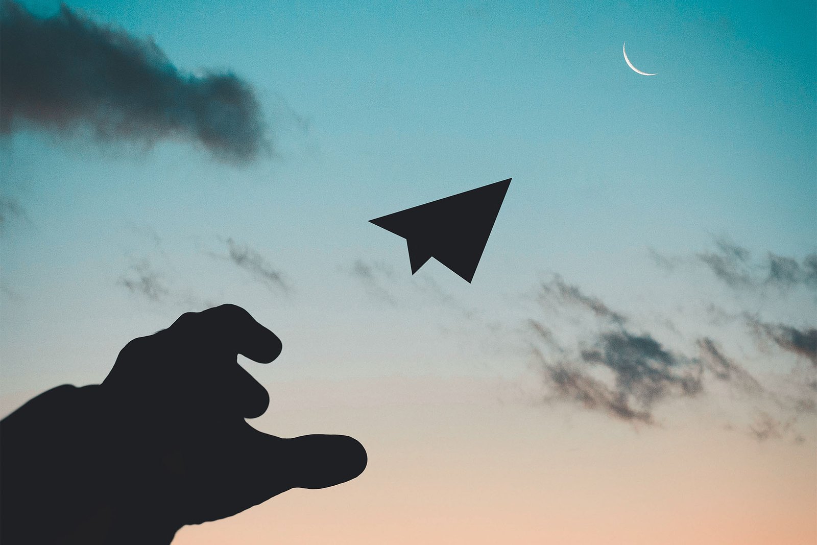 Paper airplane flying through cloudy sky illustration representing brand vision concept