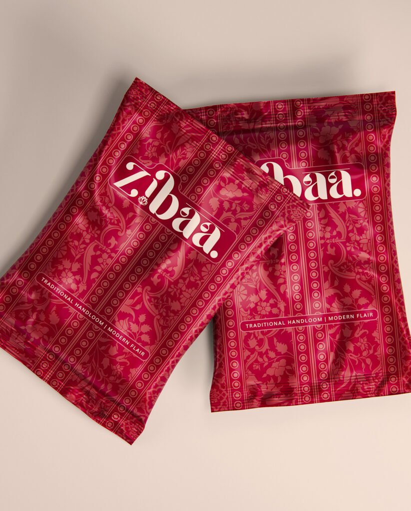 Zibaa branded packaging pouches in maroon with white logo print, product packaging design by The Design Aura